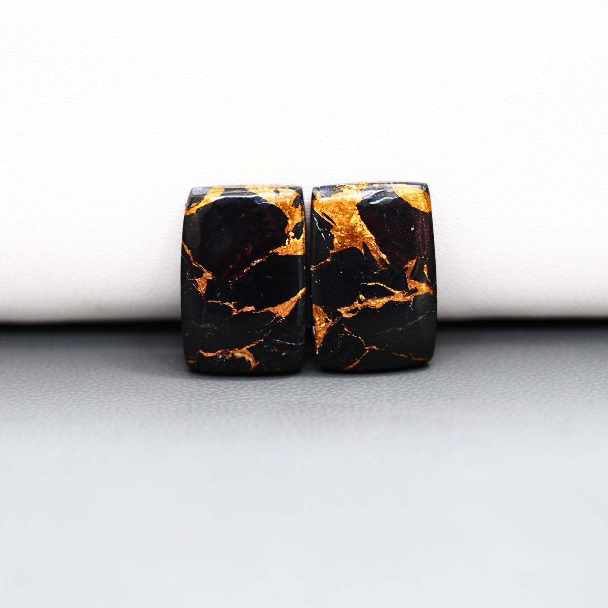 Kingman Black Buffalo Copper Composite Cushion Cabochon Pair 18x11x3mm 16.5ct - black stone with bright copper veins - Pedra Gems