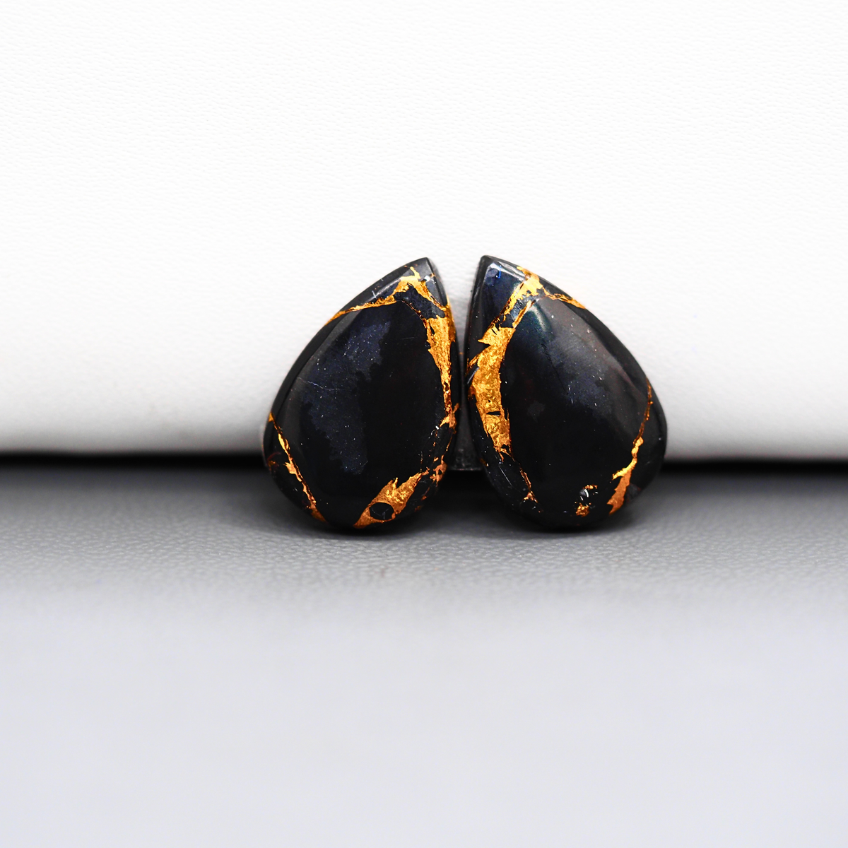 Kingman Black Buffalo Copper Composite Pear Cabochon Pair 18x12x3mm 12ct - black stone with bright copper veins - Pedra Gems