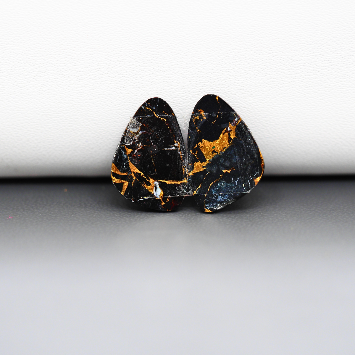 Kingman Black Buffalo Copper Composite Freeform Cabochon Pair 17x11x3mm 10ct - black stone with bright copper veins - Pedra Gems