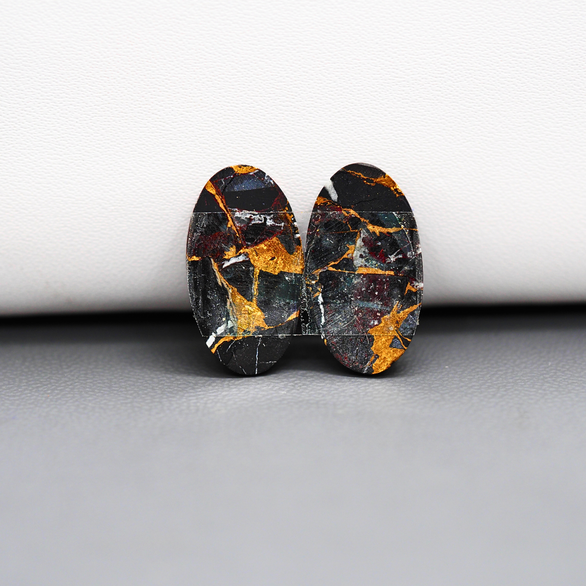 Kingman Black Buffalo Copper Composite Oval Cabochon Pair 20x11x3mm 14ct - black stone with bright copper veins - Pedra Gems