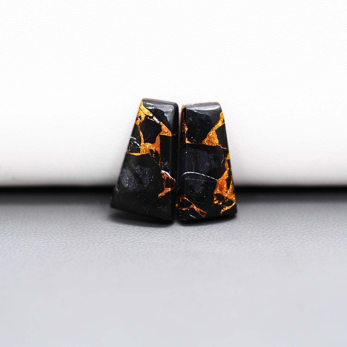 Kingman Black Buffalo Copper Composite Trapezoid Cabochon Pair 18x10x3mm 11.5ct - black stone with bright copper veins - Pedra Gems