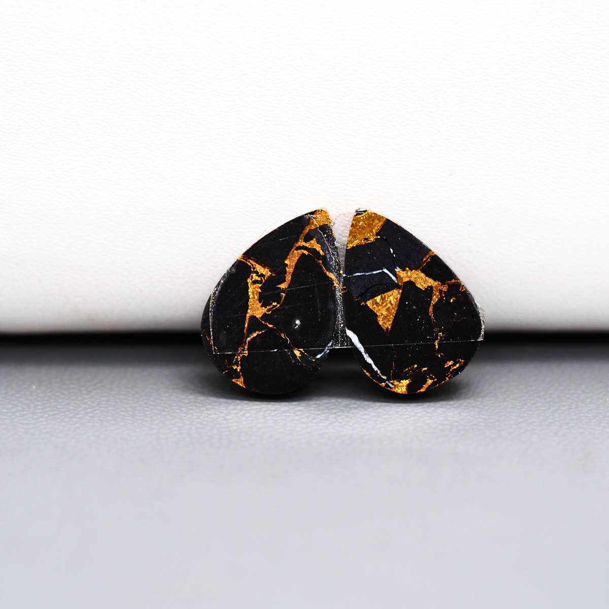 Kingman Black Buffalo Copper Composite Pear Cabochon Pair 17x11x3mm 12ct - black stone with bright copper veins - Pedra Gems