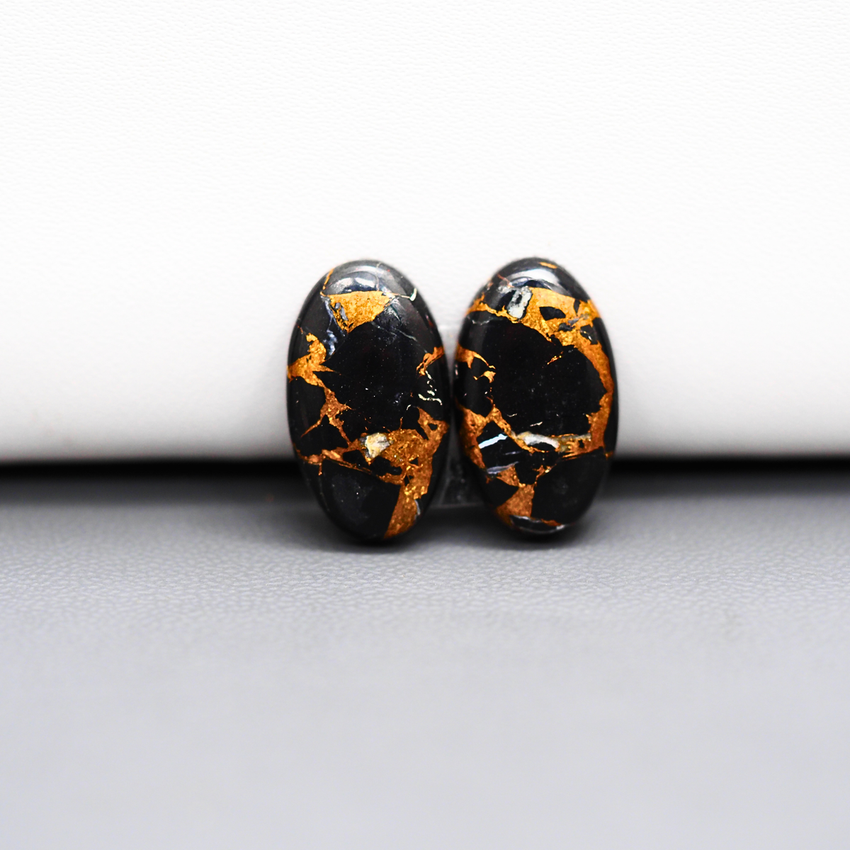 Kingman Black Buffalo Copper Composite Oval Cabochon Pair 18x11x3mm 12ct - black stone with bright copper veins - Pedra Gems