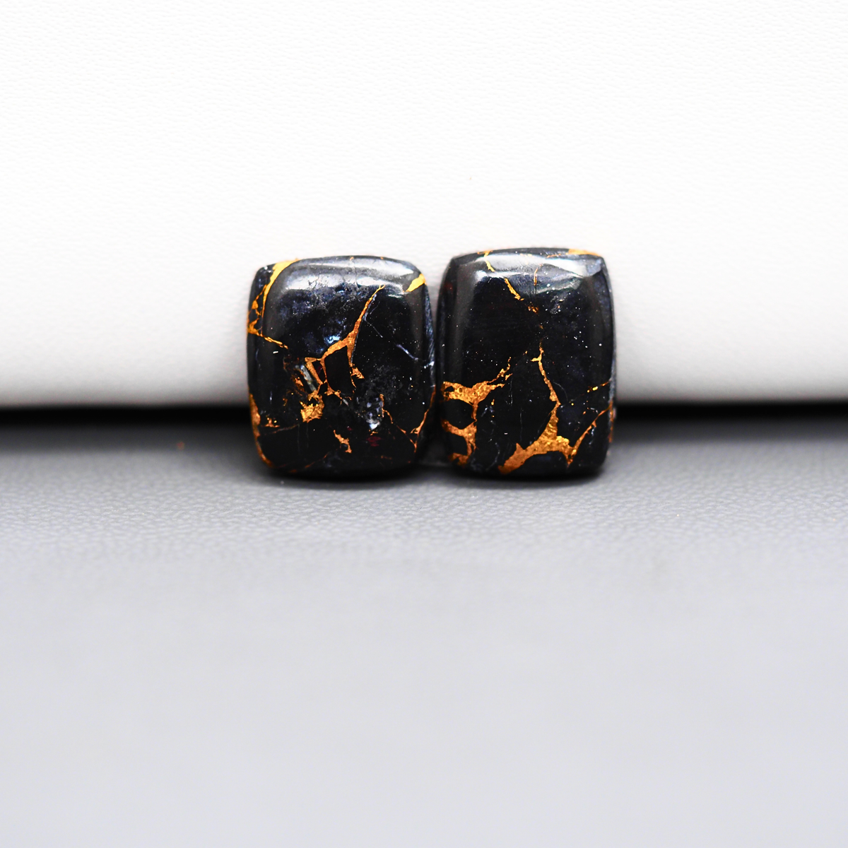 Kingman Black Buffalo Copper Composite Cushion Cabochon Pair 15x12x3mm 11.5ct - black stone with bright copper veins - Pedra Gems