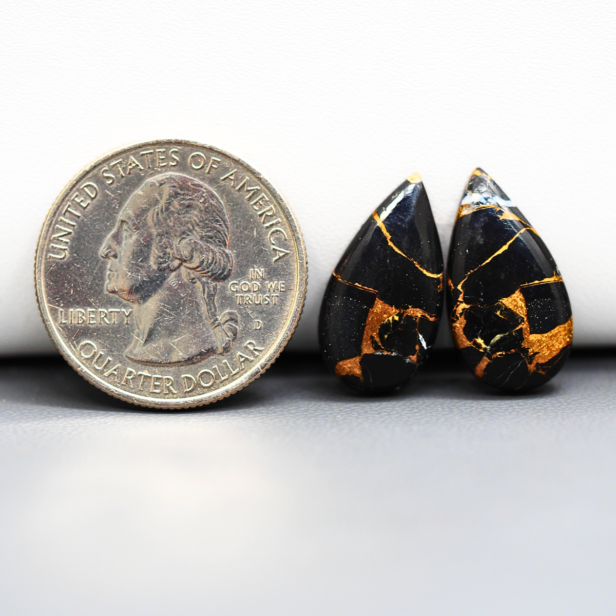 Kingman Black Buffalo Copper Composite Pear Cabochon Pair 20x11x3mm 13.5ct - black stone with bright copper veins - Pedra Gems