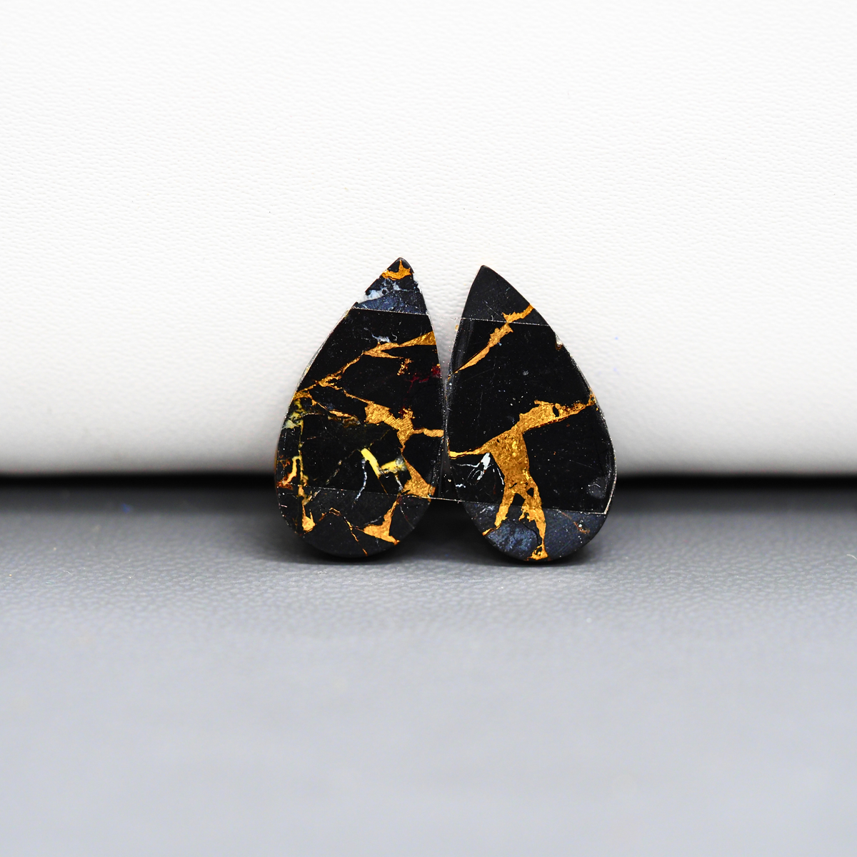 Kingman Black Buffalo Copper Composite Pear Cabochon Pair 20x11x3mm 13.5ct - black stone with bright copper veins - Pedra Gems