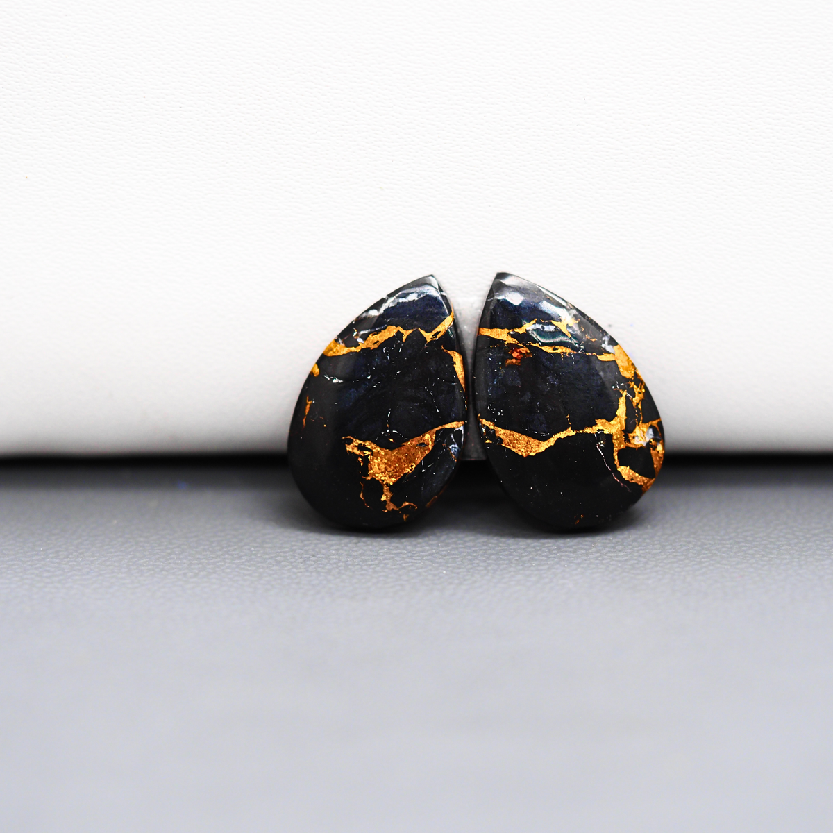 Kingman Black Buffalo Copper Composite Pear Cabochon Pair 20x13x3mm 12.5ct - black stone with bright copper veins - Pedra Gems