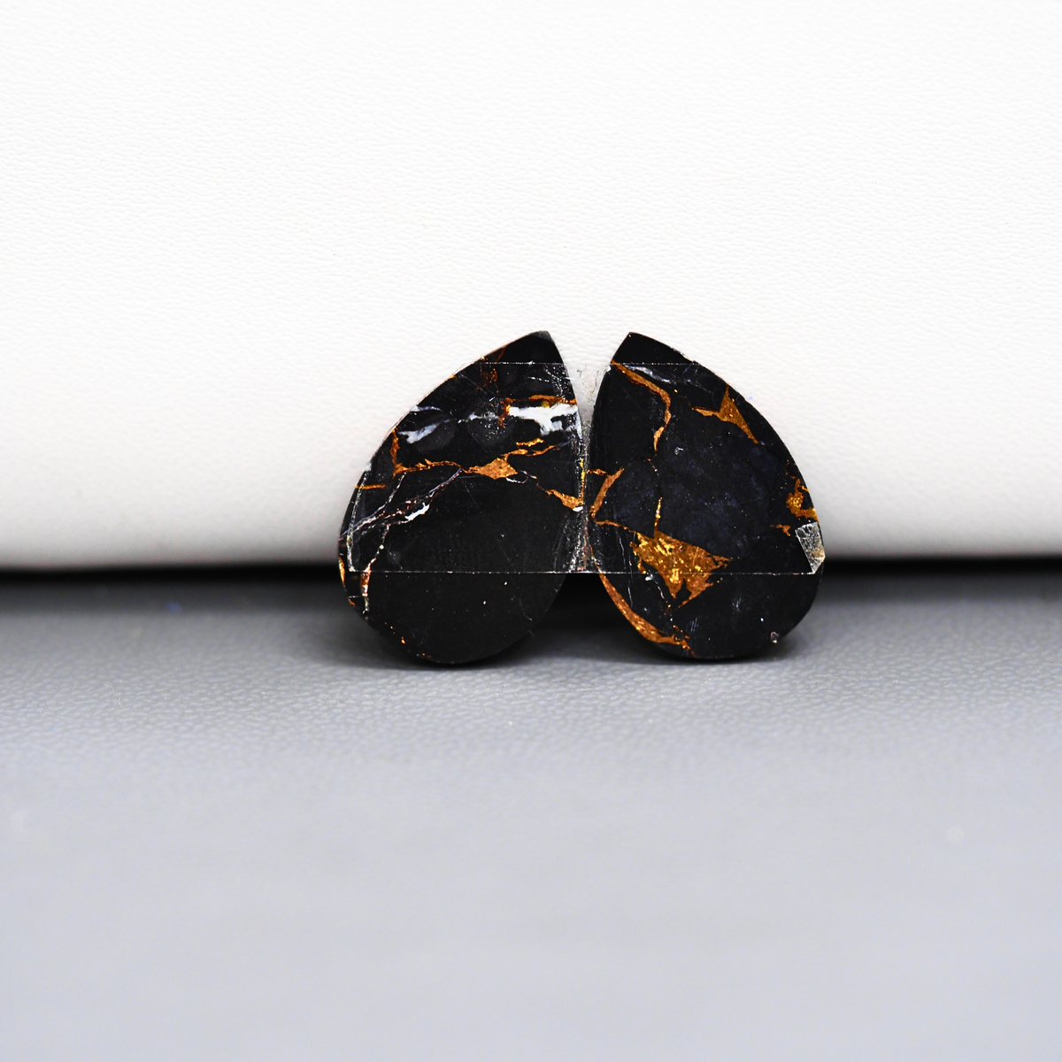Kingman Black Buffalo Copper Composite Pear Cabochon Pair 20x13x3mm 12.5ct - black stone with bright copper veins - Pedra Gems