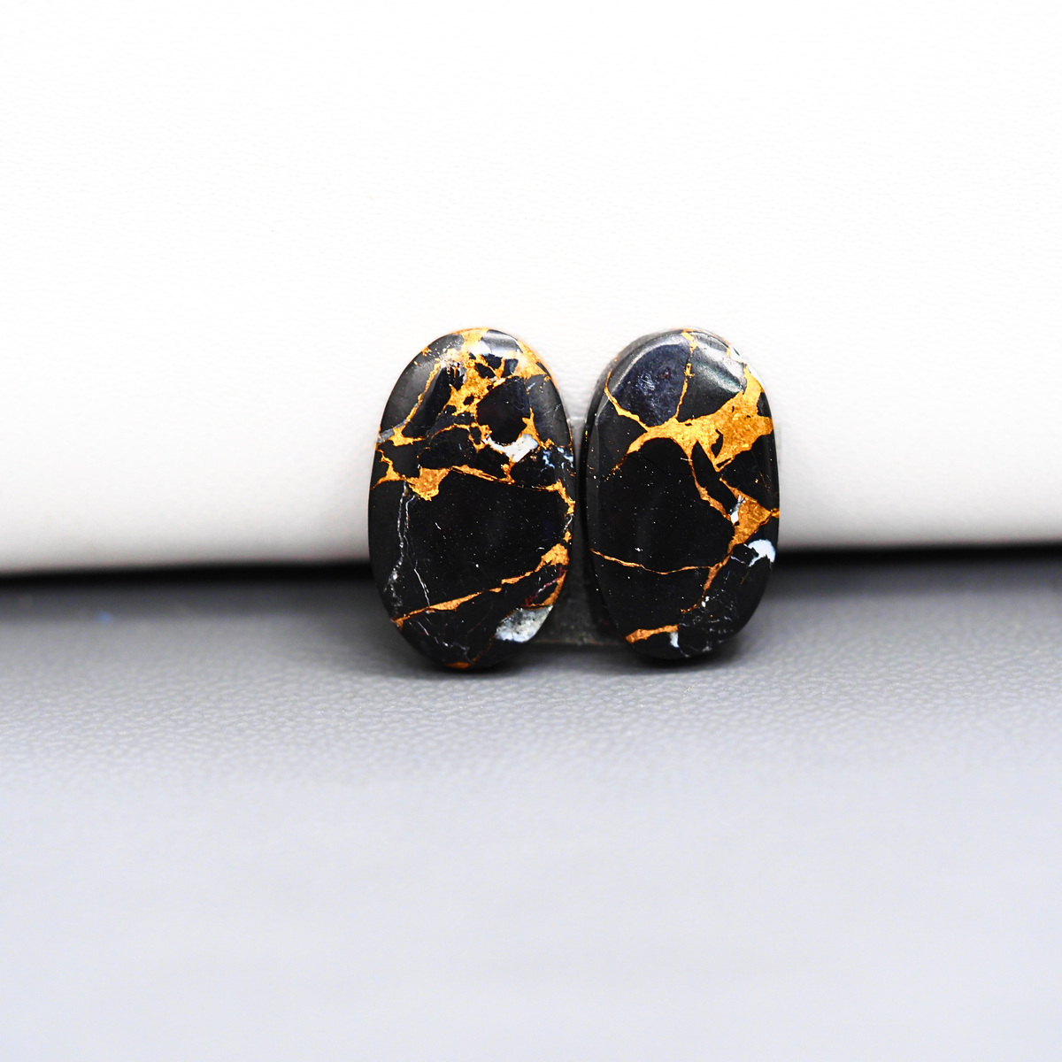 Kingman Black Buffalo Copper Composite Oval Cabochon Pair 17x10x3mm 11.5ct - black stone with bright copper veins - Pedra Gems