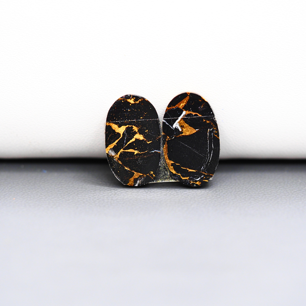 Kingman Black Buffalo Copper Composite Oval Cabochon Pair 17x10x3mm 11.5ct - black stone with bright copper veins - Pedra Gems