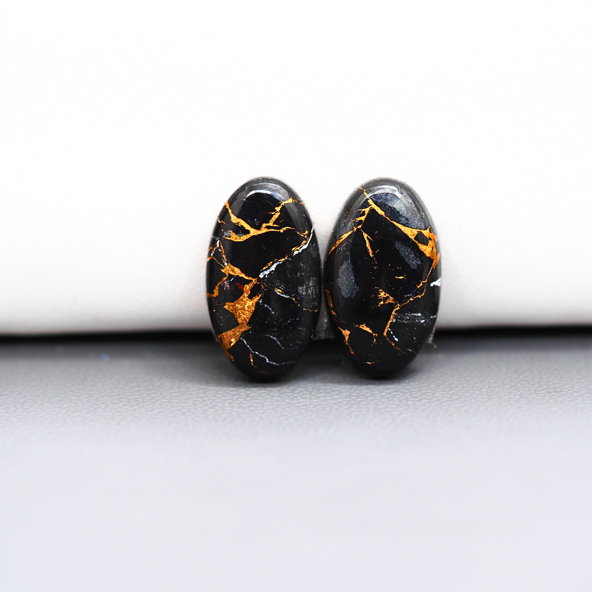 Kingman Black Buffalo Copper Composite Oval Cabochon Pair 18x11x3mm 12ct - black stone with bright copper veins - Pedra Gems
