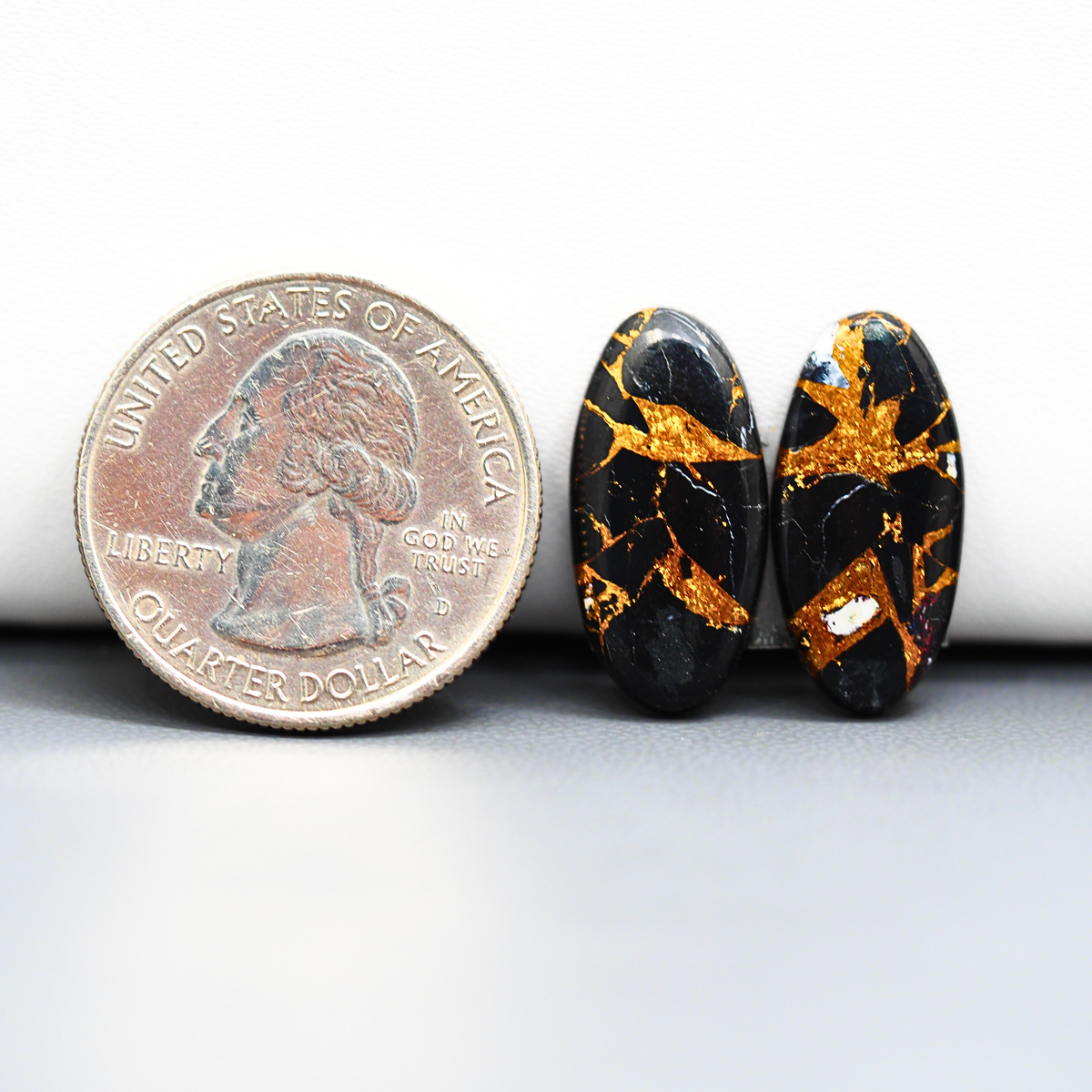 Kingman Black Buffalo Copper Composite Oval Cabochon Pair 21x10x3mm 10.5ct - black stone with bright copper veins - Pedra Gems