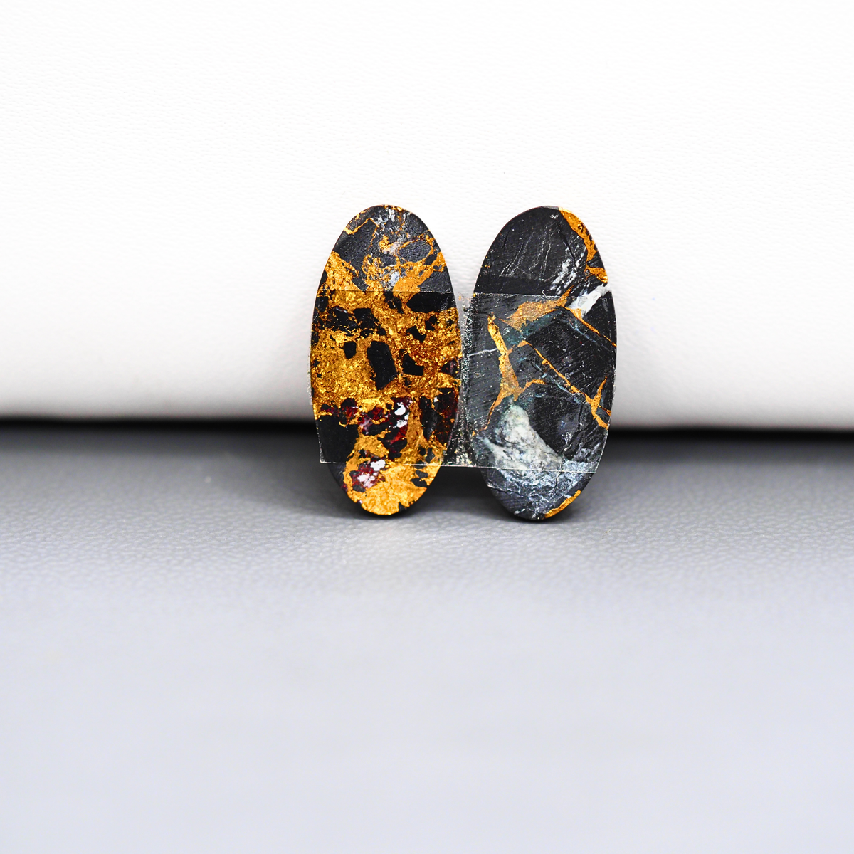 Kingman Black Buffalo Copper Composite Oval Cabochon Pair 21x10x3mm 10.5ct - black stone with bright copper veins - Pedra Gems