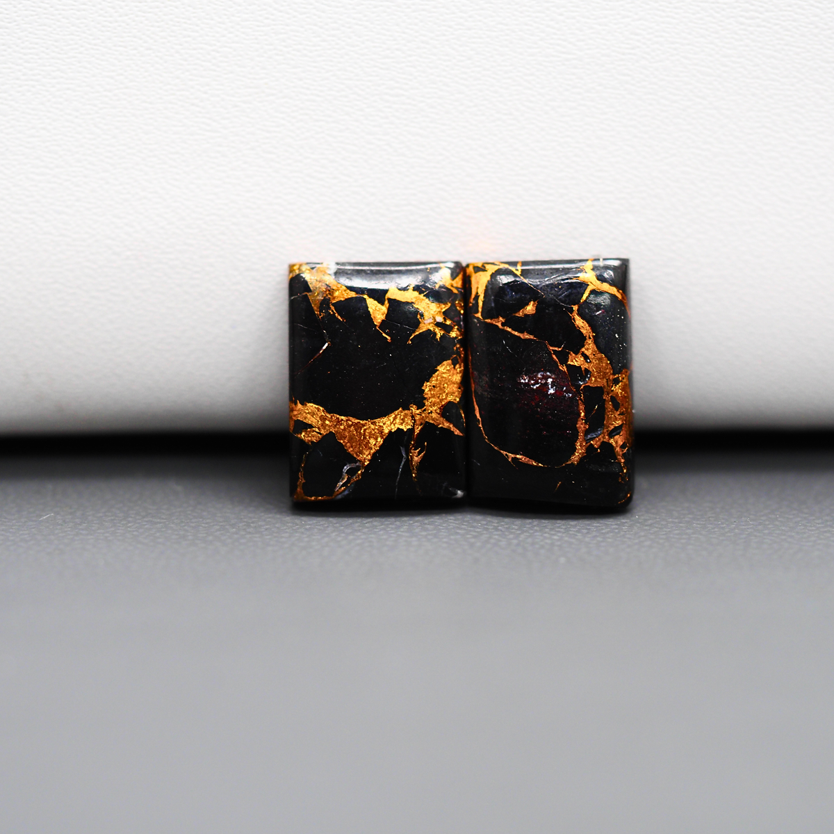 Kingman Black Buffalo Copper Composite Rectangle Cabochon Pair 15x11x3mm 14ct - black stone with bright copper veins - Pedra Gems