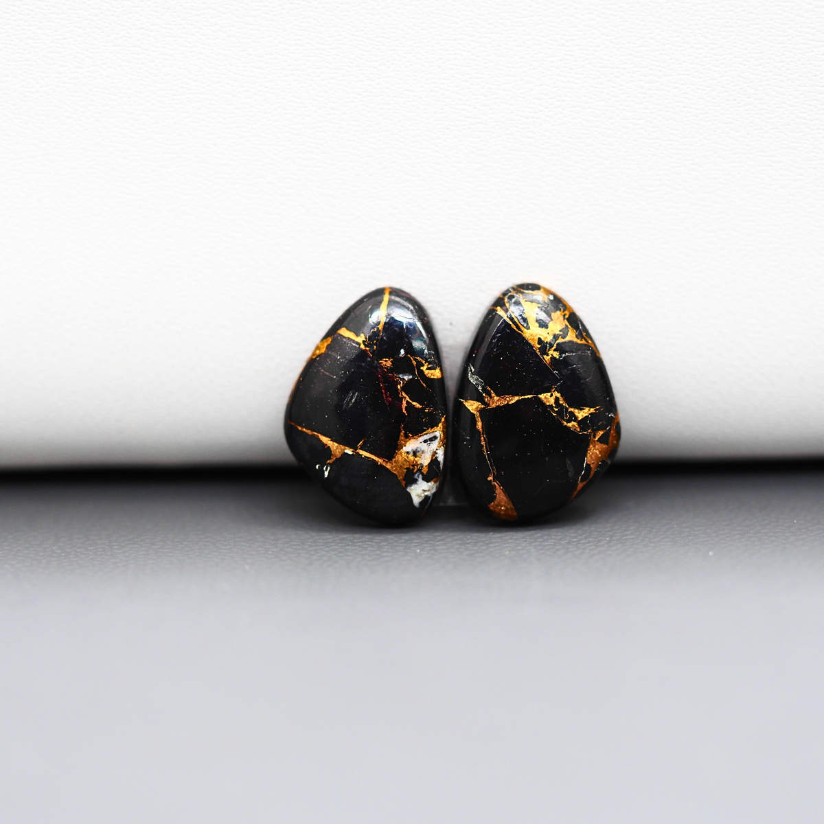 Kingman Black Buffalo Copper Composite Freeform Cabochon Pair 16x11x3mm 10ct - black stone with bright copper veins - Pedra Gems