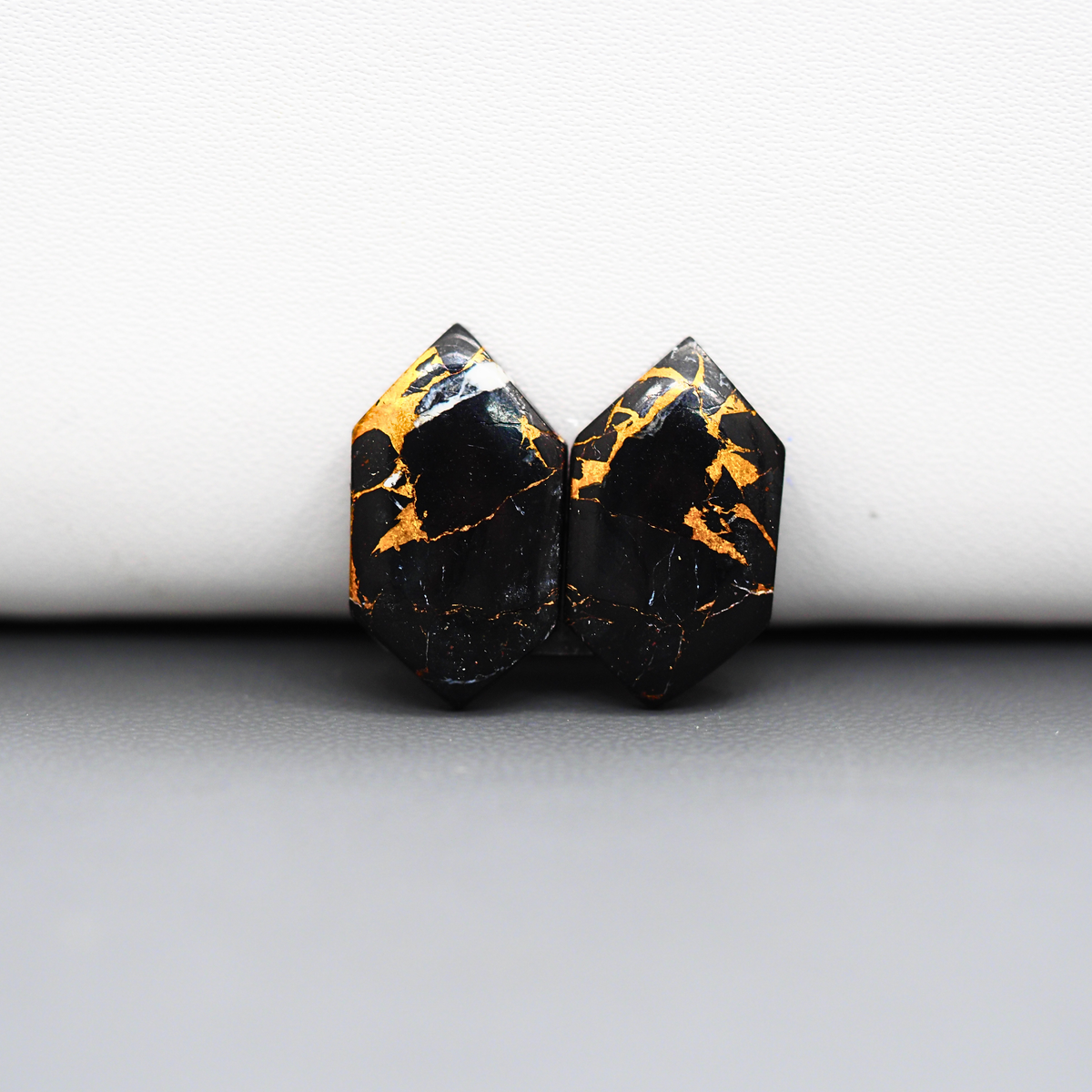 Kingman Black Buffalo Copper Composite Hexagon Cabochon Pair 19x11x3mm 13ct - black stone with bright copper veins - Pedra Gems