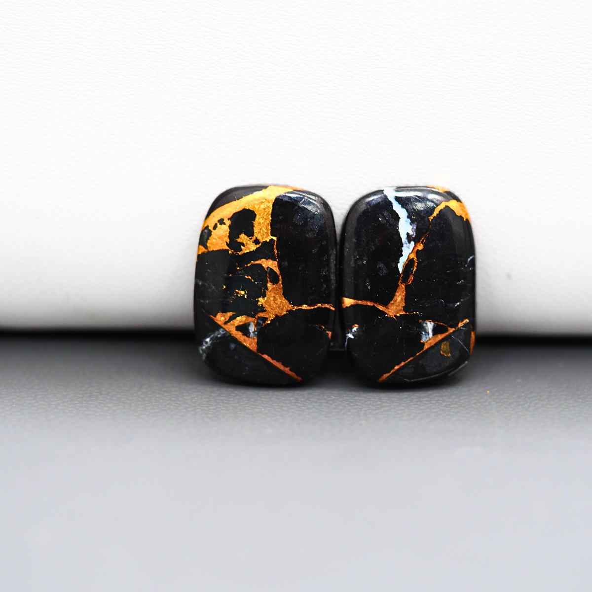 Kingman Black Buffalo Copper Composite Cushion Cabochon Pair 18x13x3mm 14ct - black stone with bright copper veins - Pedra Gems