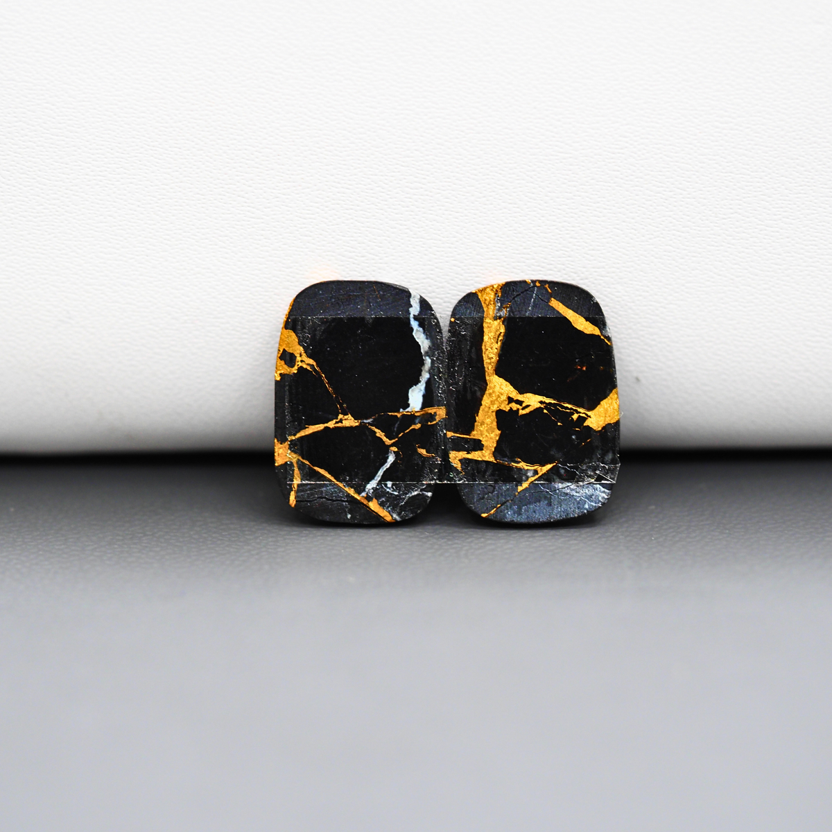Kingman Black Buffalo Copper Composite Cushion Cabochon Pair 18x13x3mm 14ct - black stone with bright copper veins - Pedra Gems