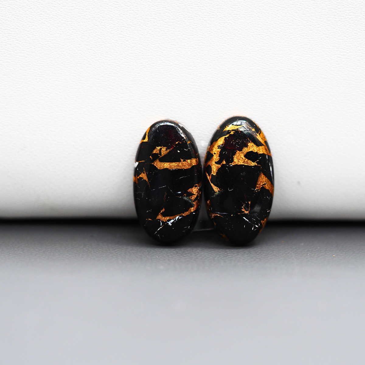 Kingman Black Buffalo Copper Composite Oval Cabochon Pair 19x10x3mm 12.5ct - black stone with bright copper veins - Pedra Gems