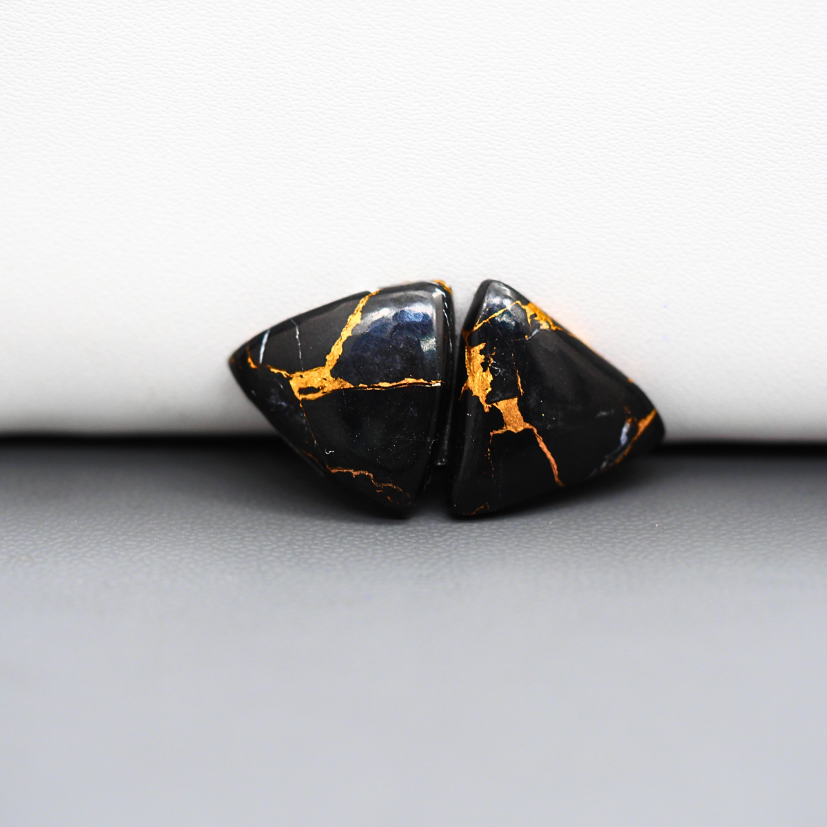 Kingman Black Buffalo Copper Composite Trillion Cabochon Pair 16x15x3mm 12ct - black stone with bright copper veins - Pedra Gems