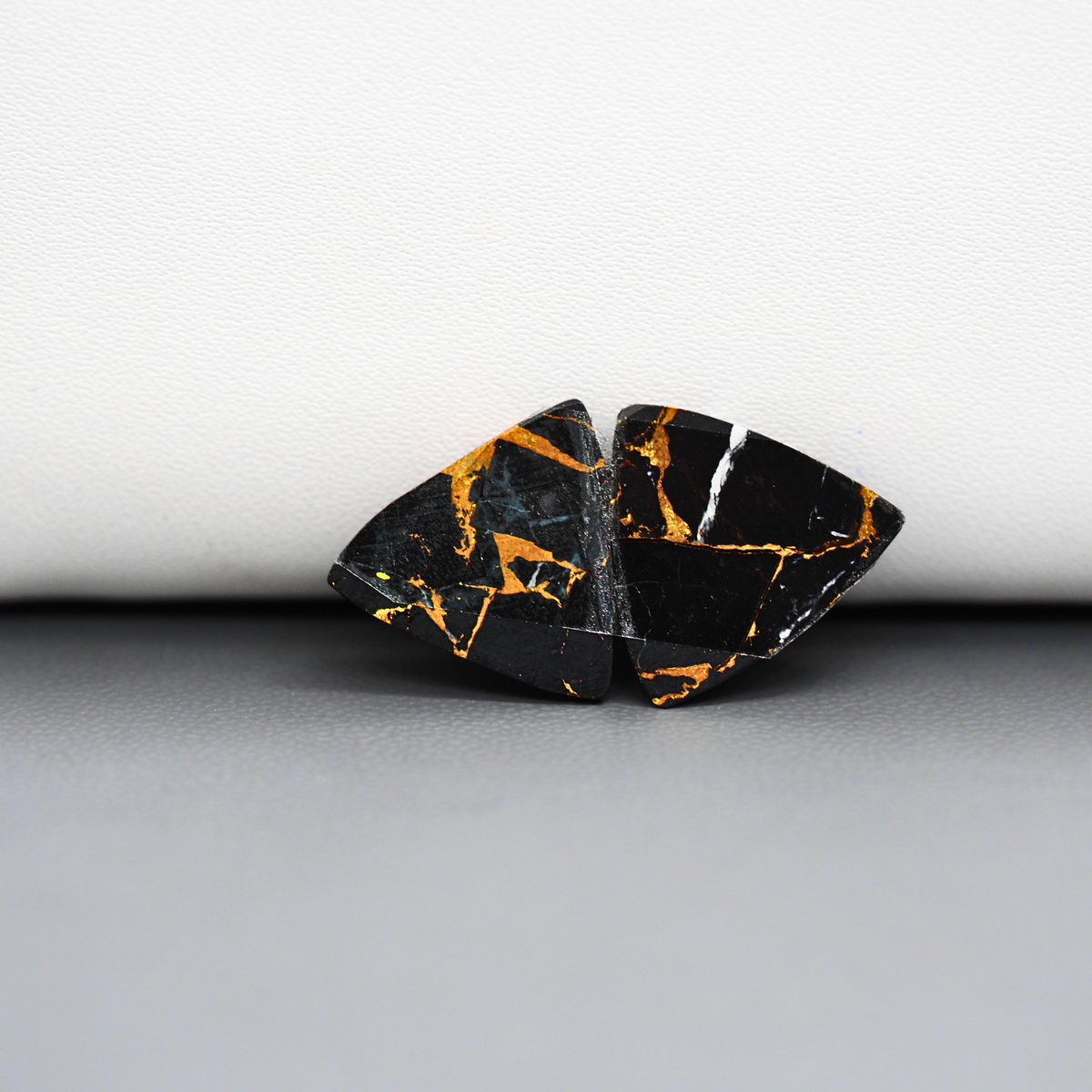 Kingman Black Buffalo Copper Composite Trillion Cabochon Pair 16x15x3mm 12ct - black stone with bright copper veins - Pedra Gems