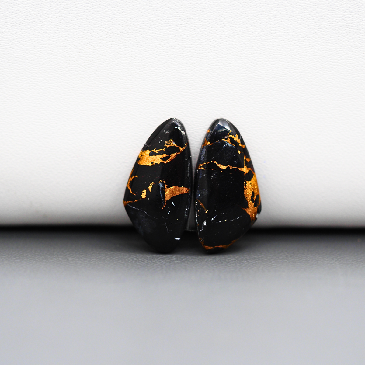 Kingman Black Buffalo Copper Composite Freeform Cabochon Pair 20x10x3mm 10.5ct - black stone with bright copper veins - Pedra Gems