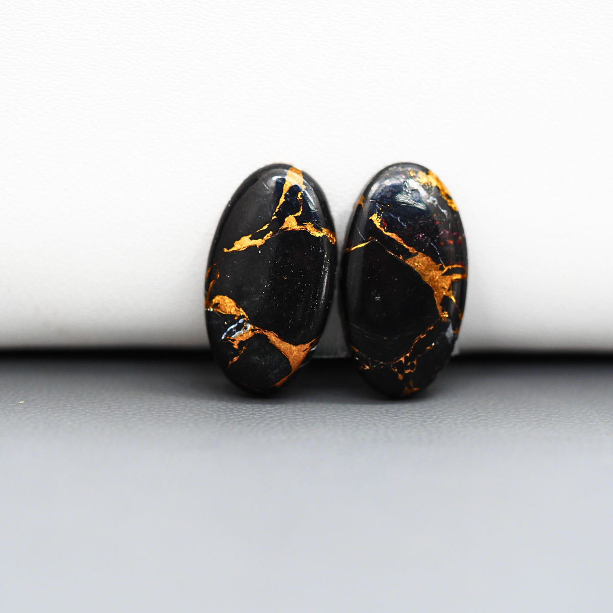 Kingman Black Buffalo Copper Composite Oval Cabochon Pair 19x11x3mm 13.5ct - black stone with bright copper veins - Pedra Gems