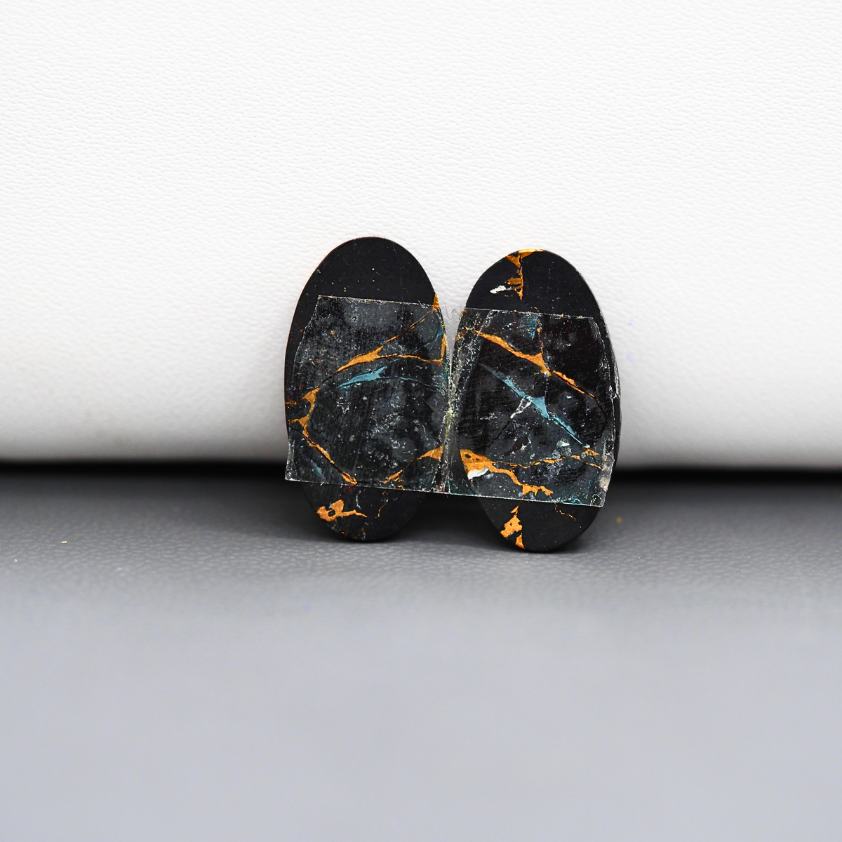 Kingman Black Buffalo Copper Composite Oval Cabochon Pair 19x11x3mm 13.5ct - black stone with bright copper veins - Pedra Gems