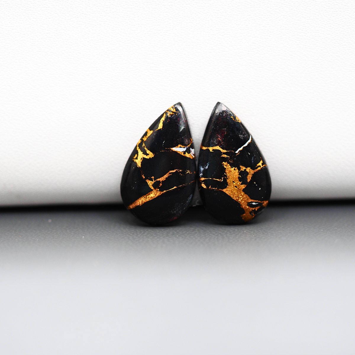 Kingman Black Buffalo Copper Composite Pear Cabochon Pair 19x11x3mm 10.5ct - black stone with bright copper veins - Pedra Gems