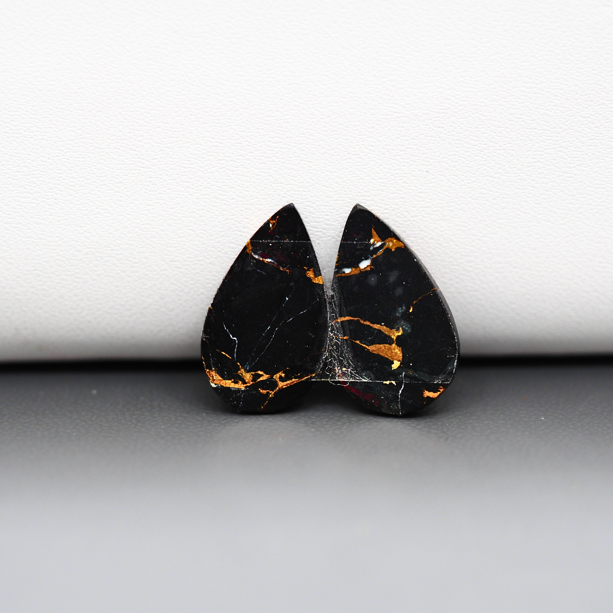 Kingman Black Buffalo Copper Composite Pear Cabochon Pair 19x11x3mm 10.5ct - black stone with bright copper veins - Pedra Gems