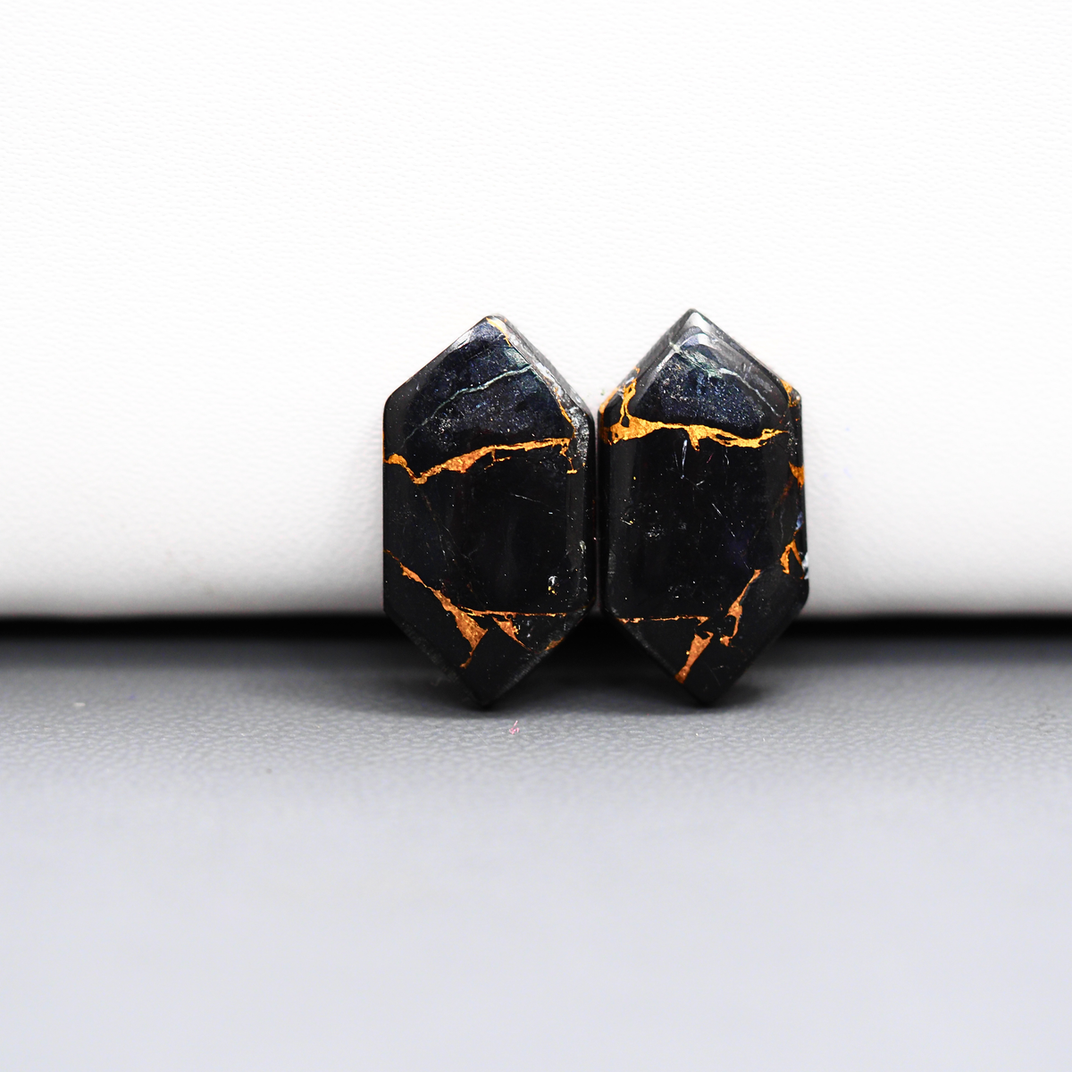 Kingman Black Buffalo Copper Composite Hexagon Cabochon Pair 20x11x3mm 12ct - black stone with bright copper veins - Pedra Gems