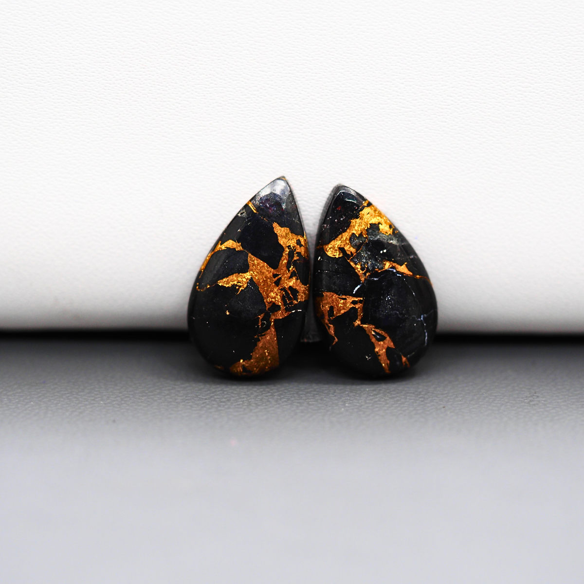 Kingman Black Buffalo Copper Composite Pear Cabochon Pair 20x12x3mm 13ct - black stone with bright copper veins - Pedra Gems