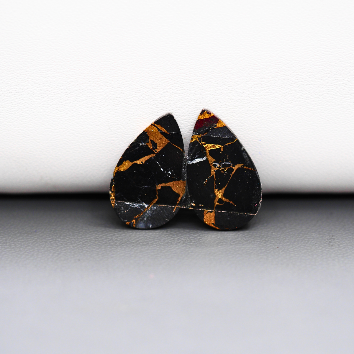 Kingman Black Buffalo Copper Composite Pear Cabochon Pair 20x12x3mm 13ct - black stone with bright copper veins - Pedra Gems