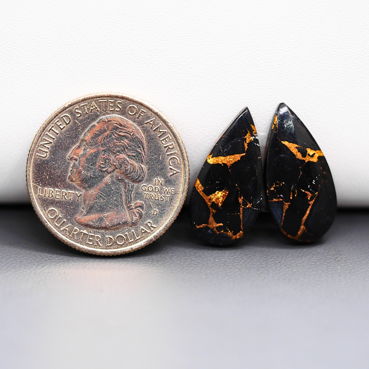 Kingman Black Buffalo Copper Composite Pear Cabochon Pair 21x11x3mm 12.5ct - black stone with bright copper veins - Pedra Gems