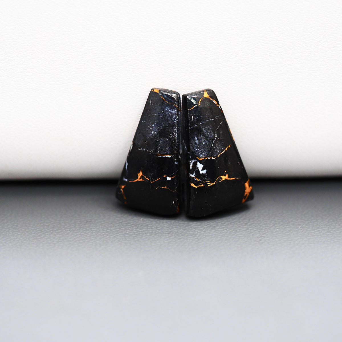 Kingman Black Buffalo Copper Composite Trapezoid Cabochon Pair 21x12x3mm 15ct - black stone with bright copper veins - Pedra Gems