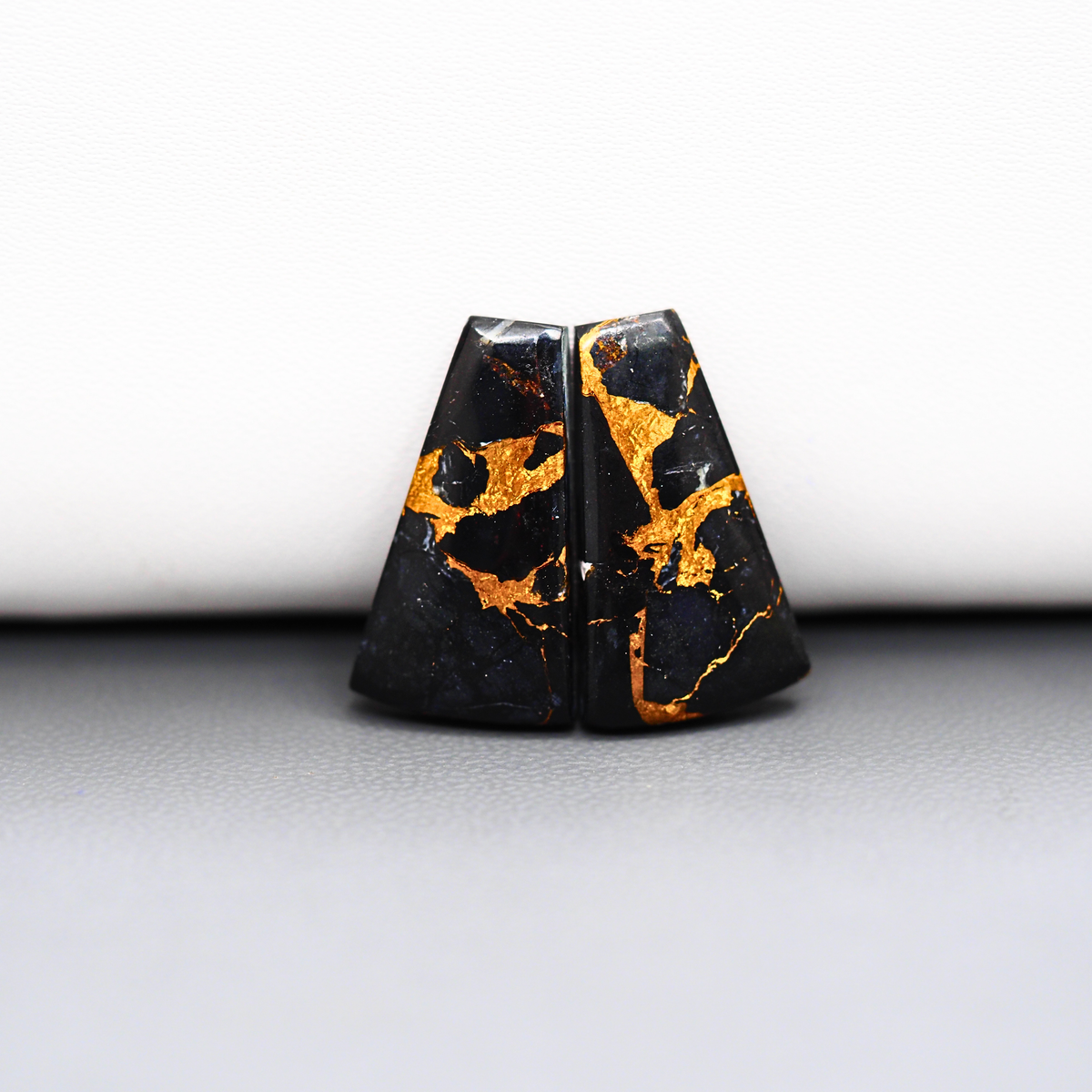 Kingman Black Buffalo Copper Composite Trapezoid Cabochon Pair 21x12x3mm 15ct - black stone with bright copper veins - Pedra Gems