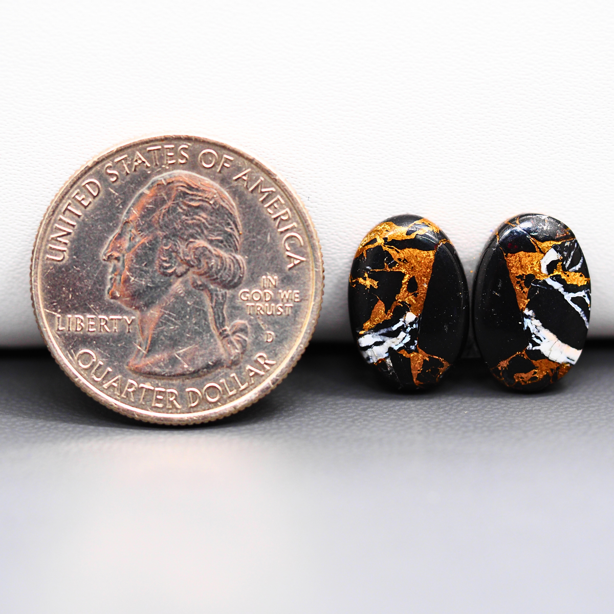 Kingman Black Buffalo Copper Composite Oval Cabochon Pair 15x10x3mm 9ct - black stone with bright copper veins - Pedra Gems