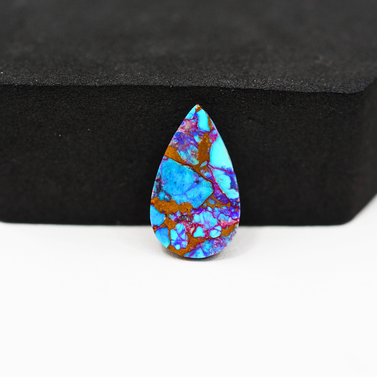 Stabilized Purple Mohave (Mojave) Turquoise Pear Cabochon 19x11x3mm 6ct - purple with blue Kingman turquoise nuggets and bronze veining - Pedra Gems.