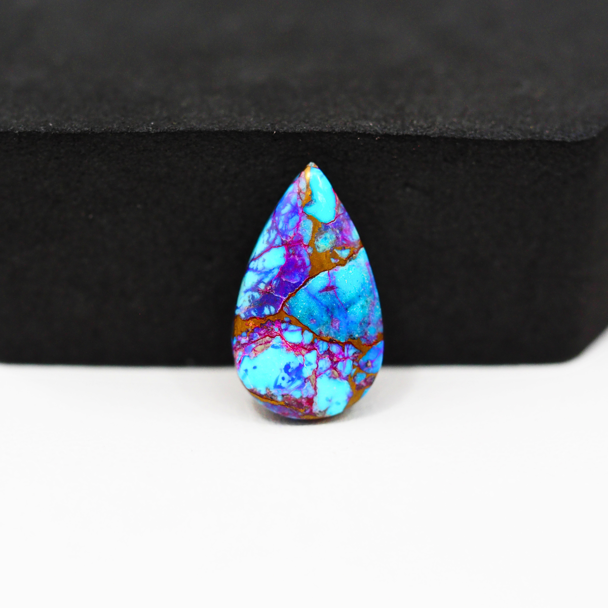 Stabilized Purple Mohave (Mojave) Turquoise Pear Cabochon 19x11x3mm 6ct - purple with blue Kingman turquoise nuggets and bronze veining - Pedra Gems.