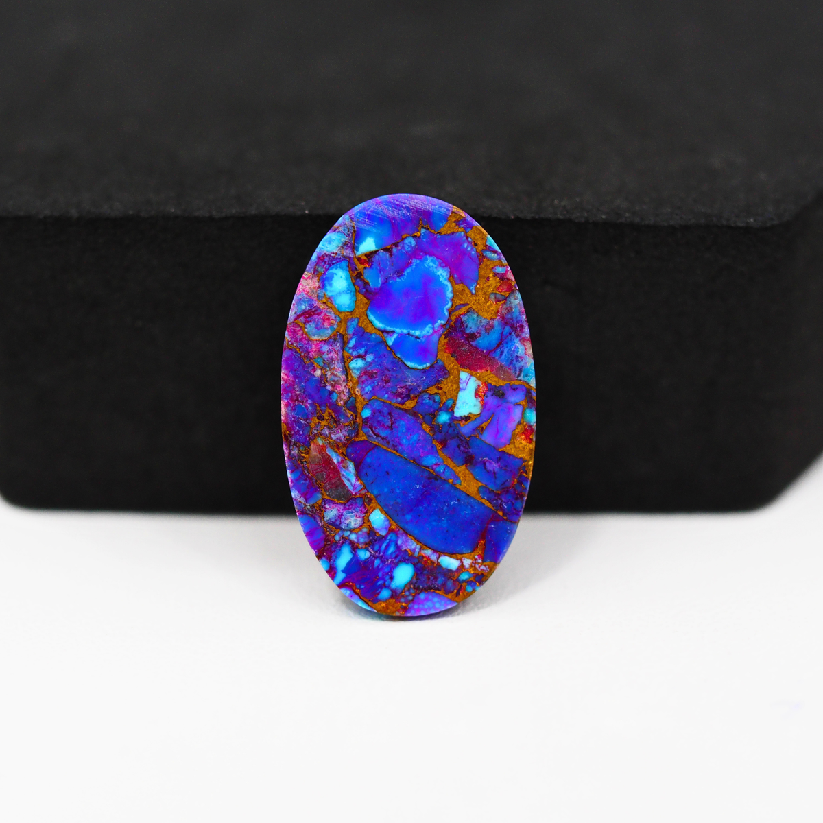 Stabilized Purple Mohave (Mojave) Turquoise Oval Cabochon 24x14x5mm 15ct - purple with blue Kingman turquoise nuggets and bronze veining - Pedra Gems.