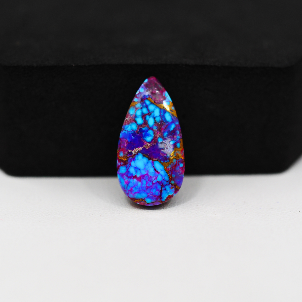 Stabilized Purple Mohave (Mojave) Turquoise Pear Cabochon 21x11x3mm 7ct - purple with blue Kingman turquoise nuggets and bronze veining - Pedra Gems.