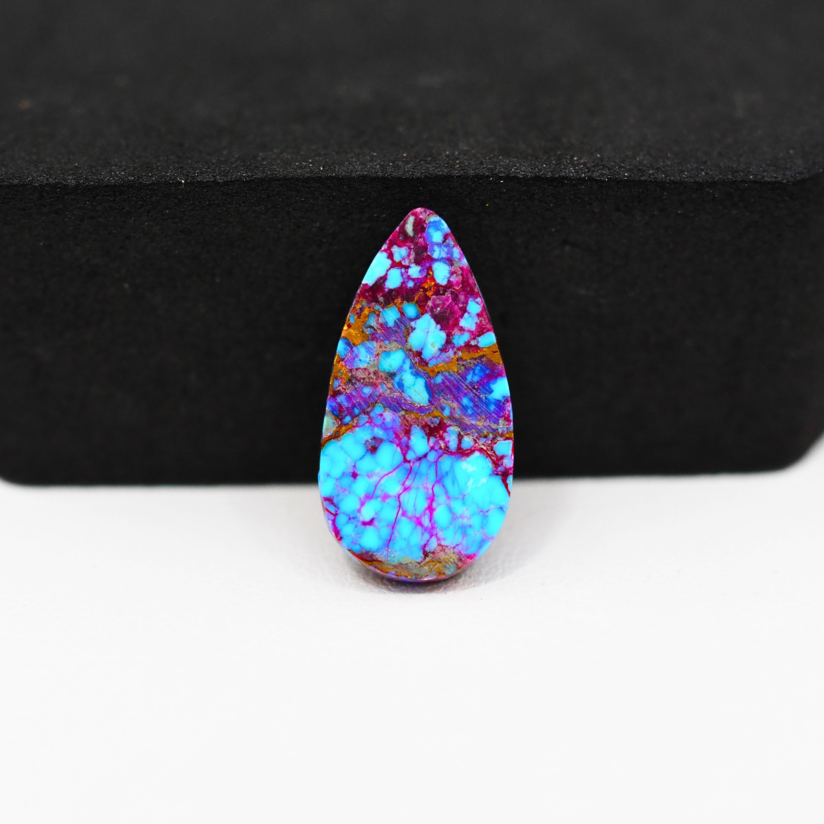 Stabilized Purple Mohave (Mojave) Turquoise Pear Cabochon 21x11x3mm 7ct - purple with blue Kingman turquoise nuggets and bronze veining - Pedra Gems.