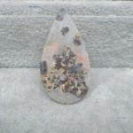 : Small Seam Agate heart cabochon 13x14mm next to ruler for size reference