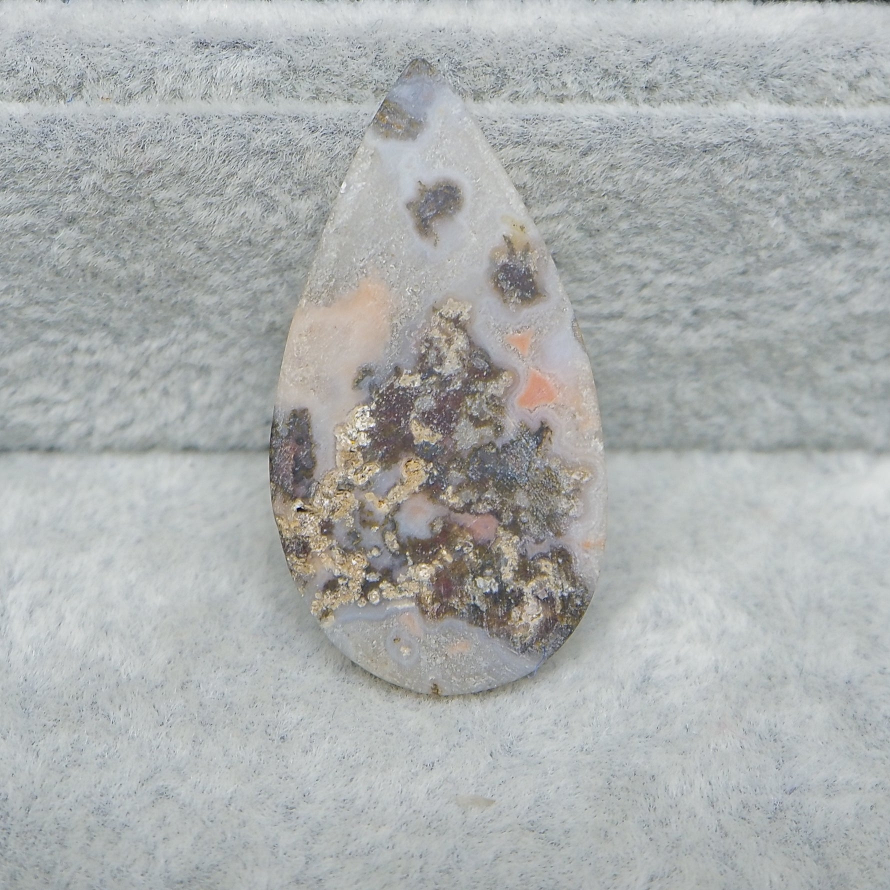 : Small Seam Agate heart cabochon 13x14mm next to ruler for size reference