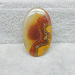 Natural Seam Agate translucent oval cabochon 29x17mm front view banding detail