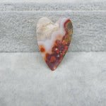 : Natural banded agate wide heart gemstone close-up pattern detail
