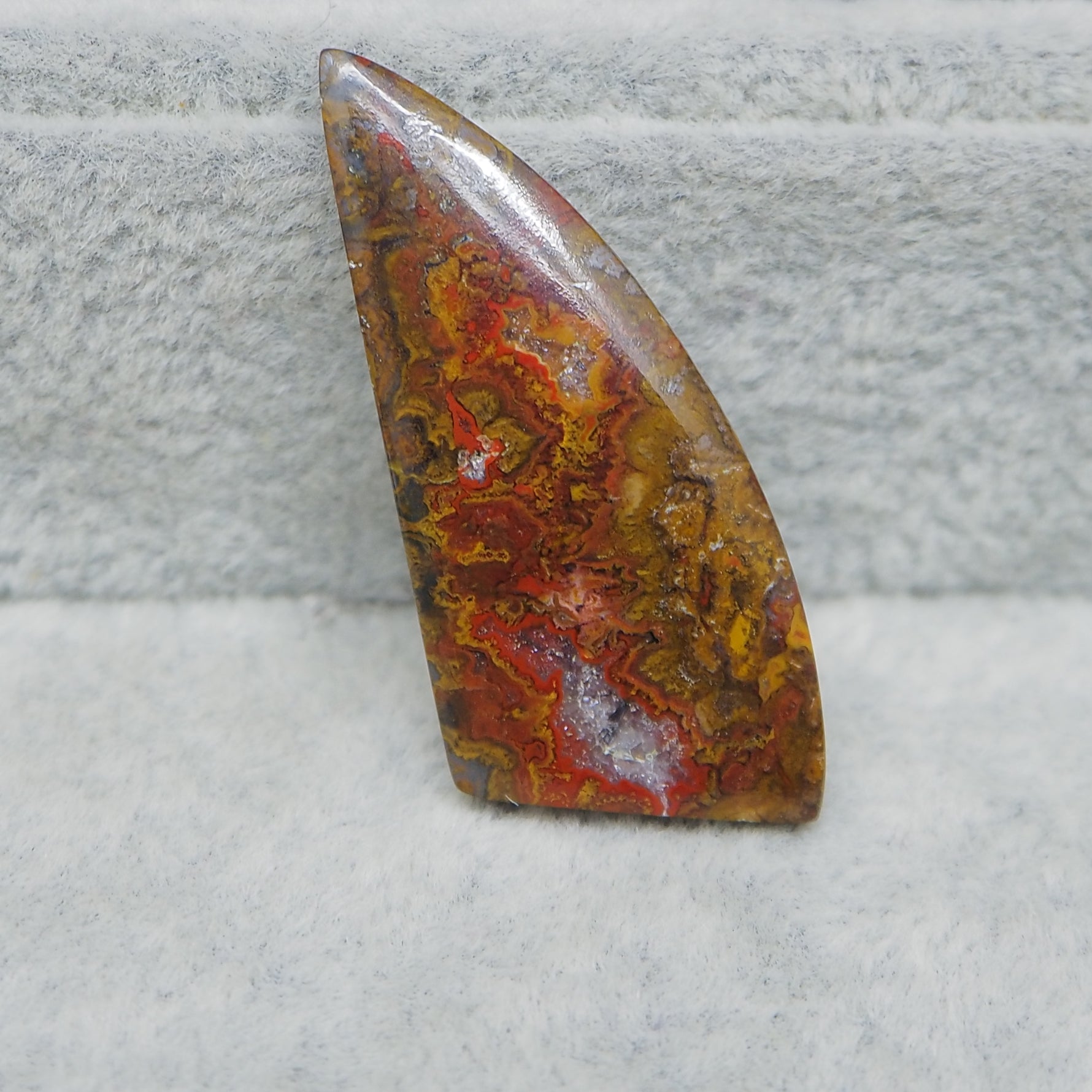 Natural red orange Seam Agate shield kite cabochon 38x16mm front view vivid banding
