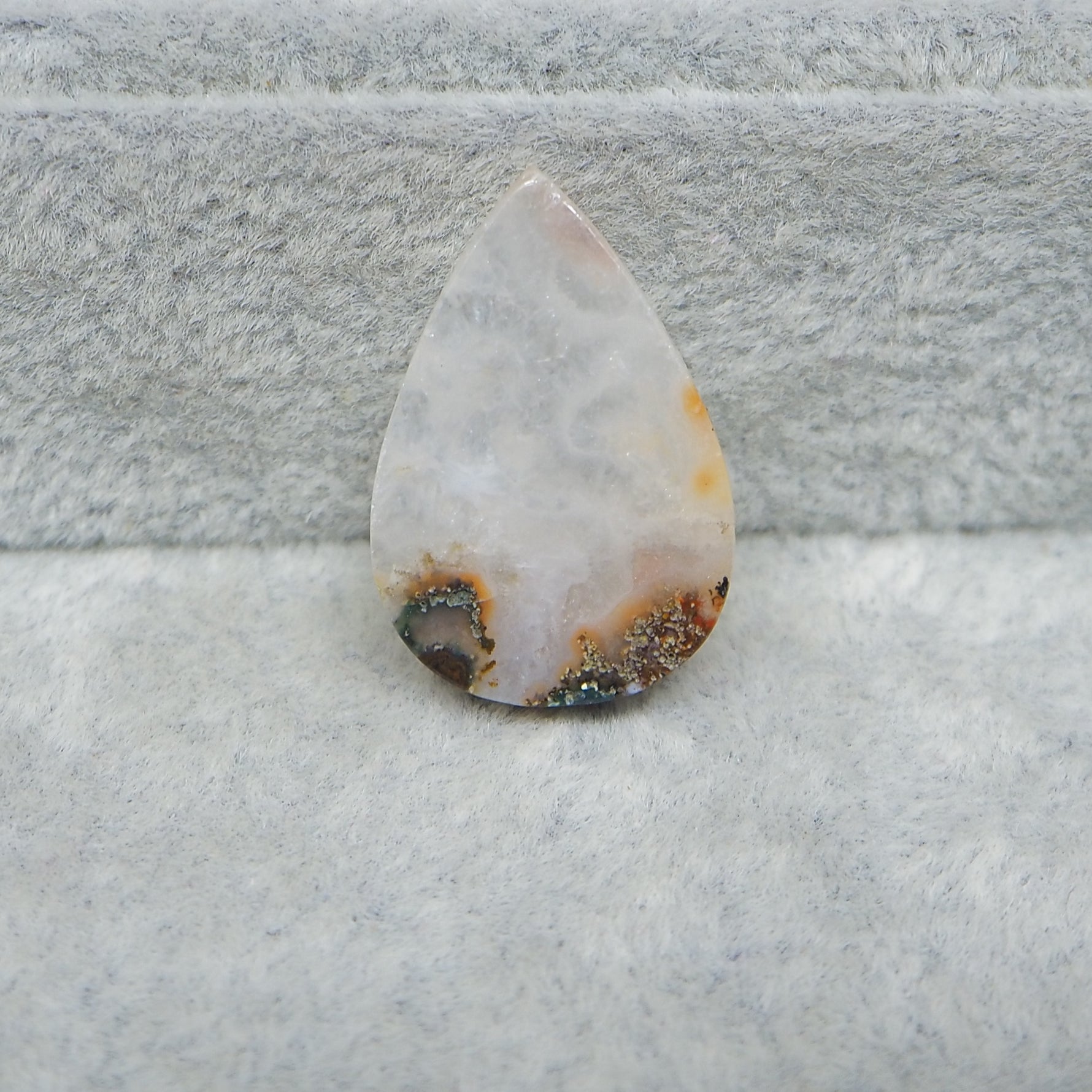 Seam Agate pear cabochon 24x16mm next to ruler for size reference Pedra Gems