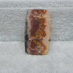  Seam Agate baguette cabochon 29x16mm next to ruler for size reference Pedra Gems