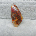 Marbled stone on a textured gray surface